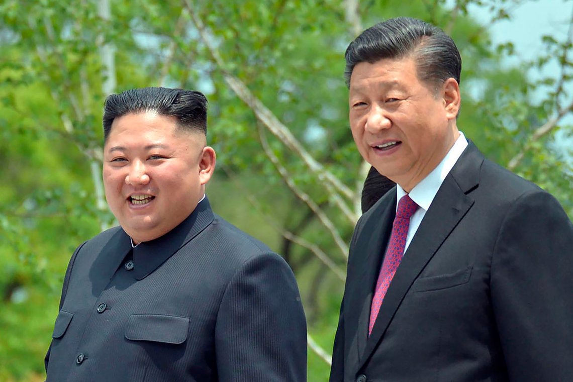 FILE - In this June 21, 2019, file photo provided by the North Korean government, North Korean leader Kim Jong Un, left, and Chinese President Xi Jinping stroll in the premises of Kumsusan guest house in Pyongyang, North Korea. Kim in a message to Xi called for stronger unity and cooperation between the countries in the face of challenges posed by hostile forces, the Norths state media and Tuesday, March 23, 2021. (Korean Central News Agency/Korea News Service via AP, File) FILE - In this June 21, 2019, file photo provided by the North Korean government, North Korean leader Kim Jong Un, left, and Chinese President Xi Jinping stroll in the premises of Kumsusan guest house in Pyongyang, North Korea. Kim in a message to Xi called for stronger unity and cooperation between the countries in the face of challenges posed by hostile forces, the Norths state media and Tuesday, March 23, 2021. (Korean Central News Agency/Korea News Service via AP, File)