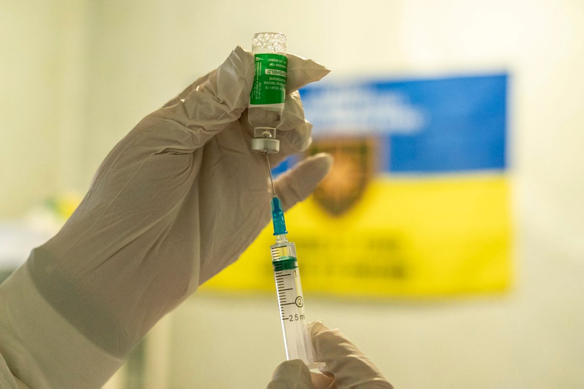 A medic prepares to administer a dose of an AstraZeneca COVID-19 vaccine marketed under the name CoviShield, to a Ukrainian serviceman at a military base near the front-line town of Krasnohorivka, eastern Ukraine, Friday, March 5, 2021. Ukrainians are becoming increasingly opposed to vaccination: an opinion poll this month by the Kyiv International Institute of Sociology found 60% of the country's people don't want to get vaccinated, up from 40% a month earlier. (AP Photo/Evgeniy Maloletka) A medic prepares to administer a dose of an AstraZeneca COVID-19 vaccine marketed under the name CoviShield, to a Ukrainian serviceman at a military base near the front-line town of Krasnohorivka, eastern Ukraine, Friday, March 5, 2021. Ukrainians are becoming increasingly opposed to vaccination: an opinion poll this month by the Kyiv International Institute of Sociology found 60% of the country's people don't want to get vaccinated, up from 40% a month earlier. (AP Photo/Evgeniy Maloletka)