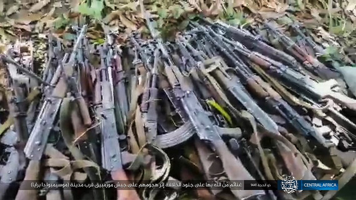 This image distributed online by the Islamic State Central Africa Province (ISCAP) and provided by SITE Intelligence Group shows weapons piled up following clashes with Mozambican government troops on Thursday, Aug. 6, 2020, near Mocimboa da Praia, in northern Mozambique. The stinging success of Mozambique's Islamic extremist rebels in seizing and holding the northern port city signals to the government, neighboring countries and the world that Africa has yet another insurgency hotspot. Writing in Arabic reads "Blessings of God are on the soldiers of the caliphate after their attack on the Mozambican army near the city of Mocimboa da Praia". (SITE Intelligence Group via AP) This image distributed online by the Islamic State Central Africa Province (ISCAP) and provided by SITE Intelligence Group shows weapons piled up following clashes with Mozambican government troops on Thursday, Aug. 6, 2020, near Mocimboa da Praia, in northern Mozambique. The stinging success of Mozambique's Islamic extremist rebels in seizing and holding the northern port city signals to the government, neighboring countries and the world that Africa has yet another insurgency hotspot. Writing in Arabic reads "Blessings of God are on the soldiers of the caliphate after their attack on the Mozambican army near the city of Mocimboa da Praia". (SITE Intelligence Group via AP)