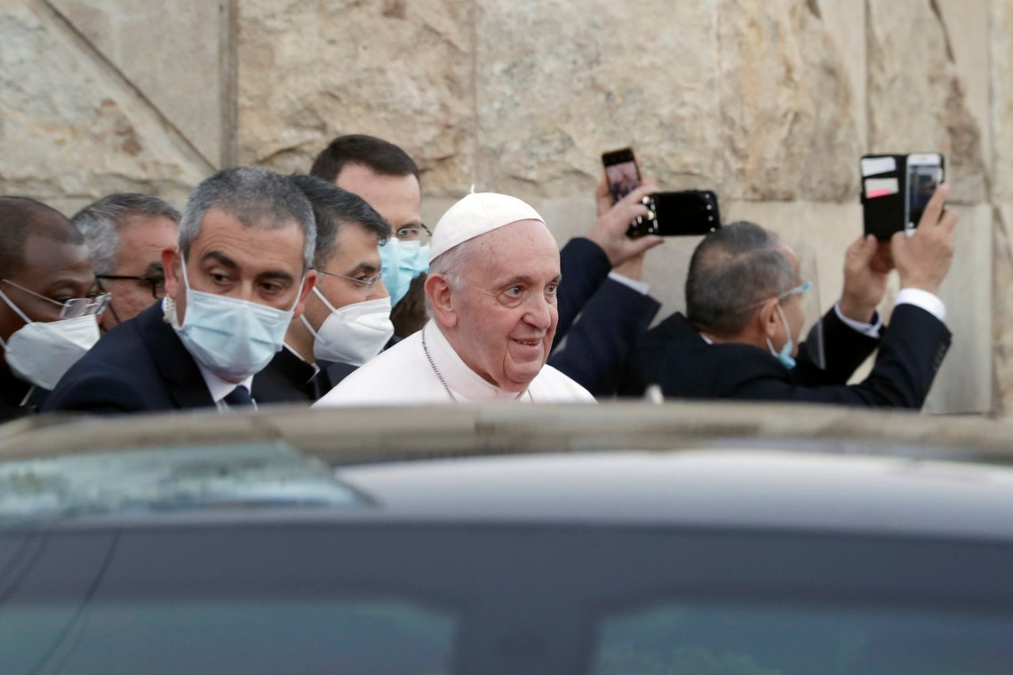 Pope Francis leaves the Sayidat al-Nejat (Our Lady of Salvation) Cathedral, in Baghdad, Iraq, Friday, March 5, 2021. Pope Francis has honored victims of one of Iraq's most brutal massacres of Christians by Islamic militants. He is making a visit to Baghdad's Our Lady of Salvation Cathedral, where he has prayed and spoke with priests, seminarians and religious sisters. In 2010, al-Qaida-linked militants gunned down worshippers at the church in an attack that left 58 people dead. (AP Photo/Andrew Medichini) Pope Francis leaves the Sayidat al-Nejat (Our Lady of Salvation) Cathedral, in Baghdad, Iraq, Friday, March 5, 2021. Pope Francis has honored victims of one of Iraq's most brutal massacres of Christians by Islamic militants. He is making a visit to Baghdad's Our Lady of Salvation Cathedral, where he has prayed and spoke with priests, seminarians and religious sisters. In 2010, al-Qaida-linked militants gunned down worshippers at the church in an attack that left 58 people dead. (AP Photo/Andrew Medichini)