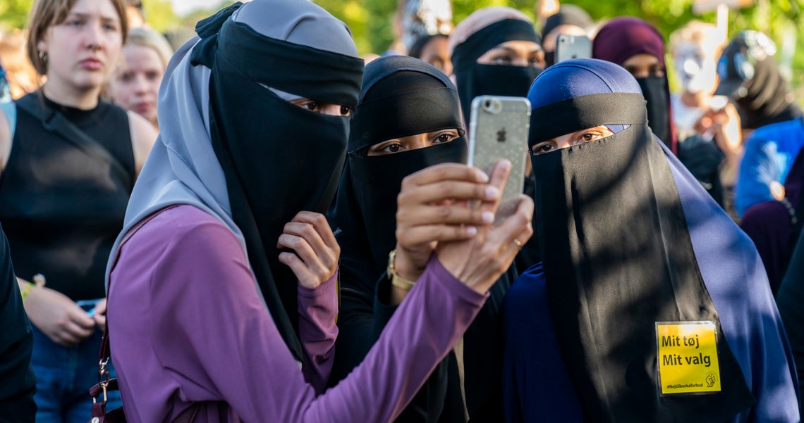 Members of the group "Kvinder i Dialog" take part in a demonstration against the first fine given for wearing the face veil niqab in Copenhagen, Friday, Aug. 10, 2018. (Martin Sylvest/Ritzau Scanpix via AP) Members of the group "Kvinder i Dialog" take part in a demonstration against the first fine given for wearing the face veil niqab in Copenhagen, Friday, Aug. 10, 2018. (Martin Sylvest/Ritzau Scanpix via AP)