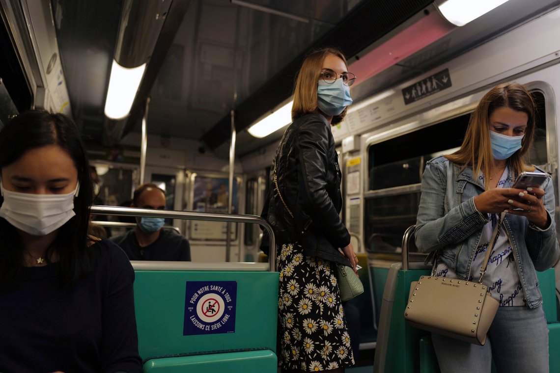 Women stand in a suburb Paris metro train wearing a protective face mask as a precaution against the coronavirus in Paris, Saturday, Sept. 5, 2020. New French cases of COVID-19 jumped in 24 hours to nearly 9,000, health officials said Friday. The 8,975 new cases were the highest number of infections since France successfully grappled with the spread of the coronavirus during a strict two-month lockdown. There were some 1,800 cases less a day earlier and more than for European neighbors. (AP Photo/Francois Mori) Women stand in a suburb Paris metro train wearing a protective face mask as a precaution against the coronavirus in Paris, Saturday, Sept. 5, 2020. New French cases of COVID-19 jumped in 24 hours to nearly 9,000, health officials said Friday. The 8,975 new cases were the highest number of infections since France successfully grappled with the spread of the coronavirus during a strict two-month lockdown. There were some 1,800 cases less a day earlier and more than for European neighbors. (AP Photo/Francois Mori)