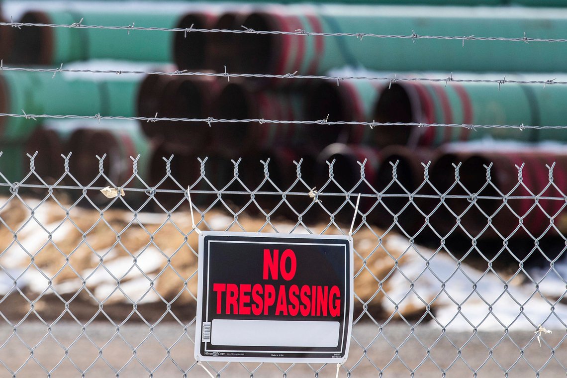 FILE - In this Dec. 18, 2020 file photo, pipes to be used for the Keystone XL pipeline are stored in a field near Dorchester, Neb. On Friday, March 5, 2021, The Associated Press reported on stories circulating online incorrectly asserting House Speaker Nancy Pelosi bought $1.5 million in foreign oil stock before President Joe Biden halted the construction of the Keystone XL pipeline. The House Speaker filed a Periodic Transaction Report on Jan. 21, 2021, which disclosed stock shares or call options made by her husband, Paul Pelosi. There are no oil companies listed on the form. (Chris Machian/Omaha World-Herald via AP) FILE - In this Dec. 18, 2020 file photo, pipes to be used for the Keystone XL pipeline are stored in a field near Dorchester, Neb. On Friday, March 5, 2021, The Associated Press reported on stories circulating online incorrectly asserting House Speaker Nancy Pelosi bought $1.5 million in foreign oil stock before President Joe Biden halted the construction of the Keystone XL pipeline. The House Speaker filed a Periodic Transaction Report on Jan. 21, 2021, which disclosed stock shares or call options made by her husband, Paul Pelosi. There are no oil companies listed on the form. (Chris Machian/Omaha World-Herald via AP)