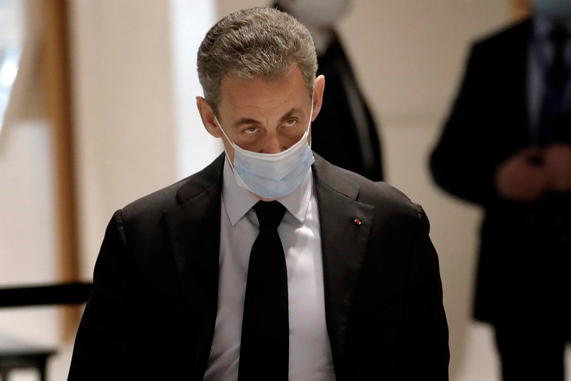 Former French President Nicolas Sarkozy arrives at the courtroom Monday, Nov. 30, 2020 in Paris. Sarkozy goes on trial on charges of corruption and influence peddling in a phone-tapping scandal, a first for the 65-year-old politician who has faced several other judicial investigations since leaving office in 2012. (AP Photo/Christophe Ena) Former French President Nicolas Sarkozy arrives at the courtroom Monday, Nov. 30, 2020 in Paris. Sarkozy goes on trial on charges of corruption and influence peddling in a phone-tapping scandal, a first for the 65-year-old politician who has faced several other judicial investigations since leaving office in 2012. (AP Photo/Christophe Ena)