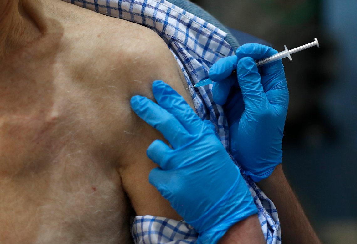 FILE - In this Tuesday, Dec. 8, 2020 file photo a nurse administers the Pfizer-BioNTech COVID-19 vaccine at Guy's Hospital in London as U.K. health authorities rolled out the first doses of a widely tested and independently reviewed COVID-19 vaccine. (AP Photo/Frank Augstein, File) FILE - In this Tuesday, Dec. 8, 2020 file photo a nurse administers the Pfizer-BioNTech COVID-19 vaccine at Guy's Hospital in London as U.K. health authorities rolled out the first doses of a widely tested and independently reviewed COVID-19 vaccine. (AP Photo/Frank Augstein, File)