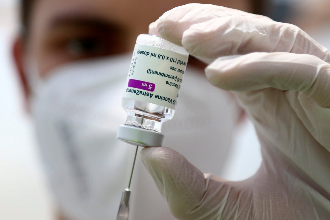 FILE - In this Monday, March 22, 2021 file photo, a member of the the medical staff prepares a syringe with the AstraZeneca coronavirus vaccine, during preparations at the vaccine center in Ebersberg near Munich, Germany. German officials have decided to limit the use of AstraZenecas coronavirus vaccine in people under 60 after more unusual blood clots were reported in a small number of people who received the shots. Earlier this month, more than a dozen countries, including Germany, suspended their use of AstraZeneca over the blood clot issue. (AP Photo/Matthias Schrader, FIle) FILE - In this Monday, March 22, 2021 file photo, a member of the the medical staff prepares a syringe with the AstraZeneca coronavirus vaccine, during preparations at the vaccine center in Ebersberg near Munich, Germany. German officials have decided to limit the use of AstraZenecas coronavirus vaccine in people under 60 after more unusual blood clots were reported in a small number of people who received the shots. Earlier this month, more than a dozen countries, including Germany, suspended their use of AstraZeneca over the blood clot issue. (AP Photo/Matthias Schrader, FIle)