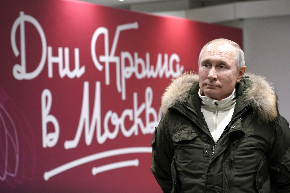 Russian President Vladimir Putin attends a concert marking the seventh anniversary of Russia's annexation of Crimea at Luzhniki Stadium in Moscow, Russia March 18, 2021. Sputnik/Alexei Druzhinin/Kremlin via REUTERS ATTENTION EDITORS - THIS IMAGE WAS PROVIDED BY A THIRD PARTY. Russian President Vladimir Putin attends a concert marking the seventh anniversary of Russia's annexation of Crimea at Luzhniki Stadium in Moscow, Russia March 18, 2021. Sputnik/Alexei Druzhinin/Kremlin via REUTERS ATTENTION EDITORS - THIS IMAGE WAS PROVIDED BY A THIRD PARTY.
