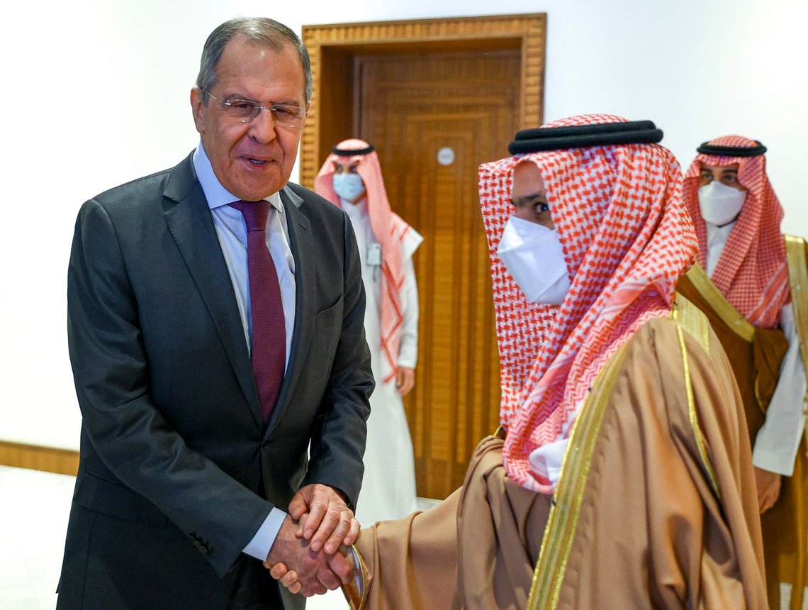 In this handout photo released by Russian Foreign Ministry Press Service, Russian Foreign Minister Sergey Lavrov, left, and Saudi Foreign Minister Prince Faisal bin Farhan Al-Saud shake hands prior to their talks in Riyadh, Saudi Arabia, Wednesday, March 10, 2021. (Russian Foreign Ministry Press Service via AP) In this handout photo released by Russian Foreign Ministry Press Service, Russian Foreign Minister Sergey Lavrov, left, and Saudi Foreign Minister Prince Faisal bin Farhan Al-Saud shake hands prior to their talks in Riyadh, Saudi Arabia, Wednesday, March 10, 2021. (Russian Foreign Ministry Press Service via AP)