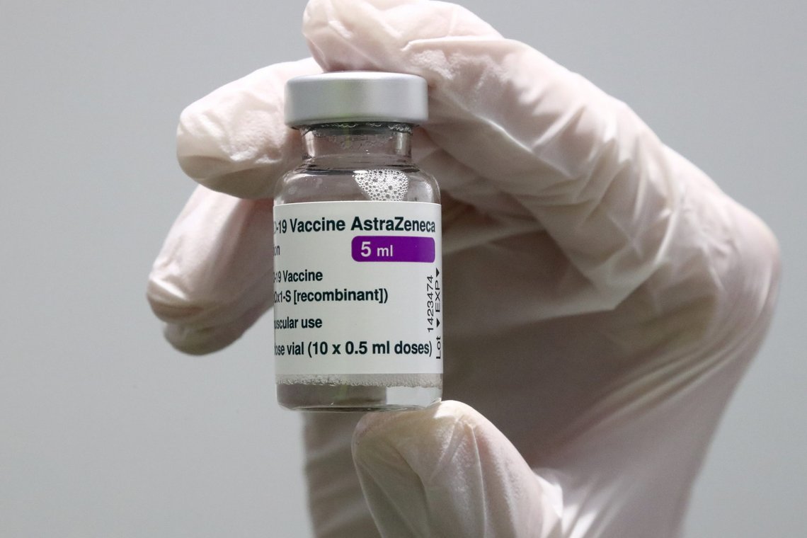 FILE - In this Monday, March 22, 2021 file photo medical staff prepares an AstraZeneca coronavirus vaccine during preparations at the vaccine center in Ebersberg near Munich, Germany. The European Union drug regulator said Wednesday April 7, that it found a possible link between the AstraZeneca coronavirus vaccine and a rare clotting disorder but declined to impose any new age restrictions, saying the benefits of the shot still outweigh risks. Its U.K. counterpart, however, said it would offer people under 30 the choice of another product. (AP Photo/Matthias Schrader, File) FILE - In this Monday, March 22, 2021 file photo medical staff prepares an AstraZeneca coronavirus vaccine during preparations at the vaccine center in Ebersberg near Munich, Germany. The European Union drug regulator said Wednesday April 7, that it found a possible link between the AstraZeneca coronavirus vaccine and a rare clotting disorder but declined to impose any new age restrictions, saying the benefits of the shot still outweigh risks. Its U.K. counterpart, however, said it would offer people under 30 the choice of another product. (AP Photo/Matthias Schrader, File)