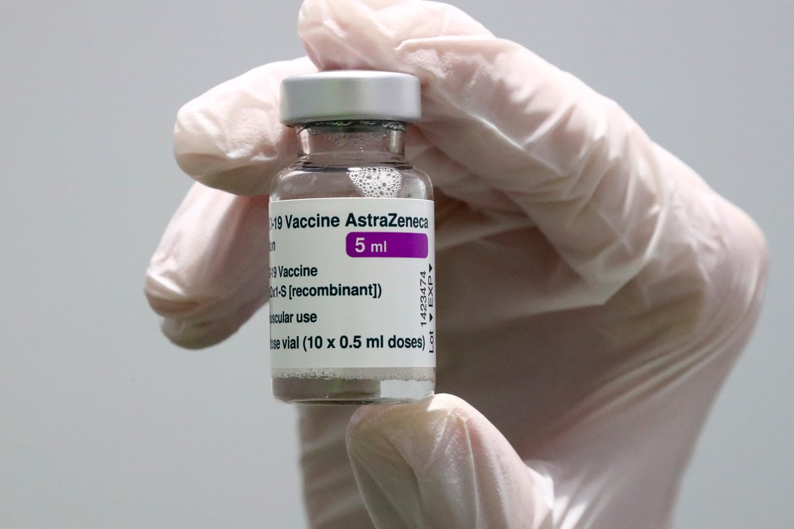 FILE - In this Monday, March 22, 2021 file photo medical staff prepares an AstraZeneca coronavirus vaccine during preparations at the vaccine center in Ebersberg near Munich, Germany. The European Union drug regulator said Wednesday April 7, that it found a possible link between the AstraZeneca coronavirus vaccine and a rare clotting disorder but declined to impose any new age restrictions, saying the benefits of the shot still outweigh risks. Its U.K. counterpart, however, said it would offer people under 30 the choice of another product. (AP Photo/Matthias Schrader, File) FILE - In this Monday, March 22, 2021 file photo medical staff prepares an AstraZeneca coronavirus vaccine during preparations at the vaccine center in Ebersberg near Munich, Germany. The European Union drug regulator said Wednesday April 7, that it found a possible link between the AstraZeneca coronavirus vaccine and a rare clotting disorder but declined to impose any new age restrictions, saying the benefits of the shot still outweigh risks. Its U.K. counterpart, however, said it would offer people under 30 the choice of another product. (AP Photo/Matthias Schrader, File)