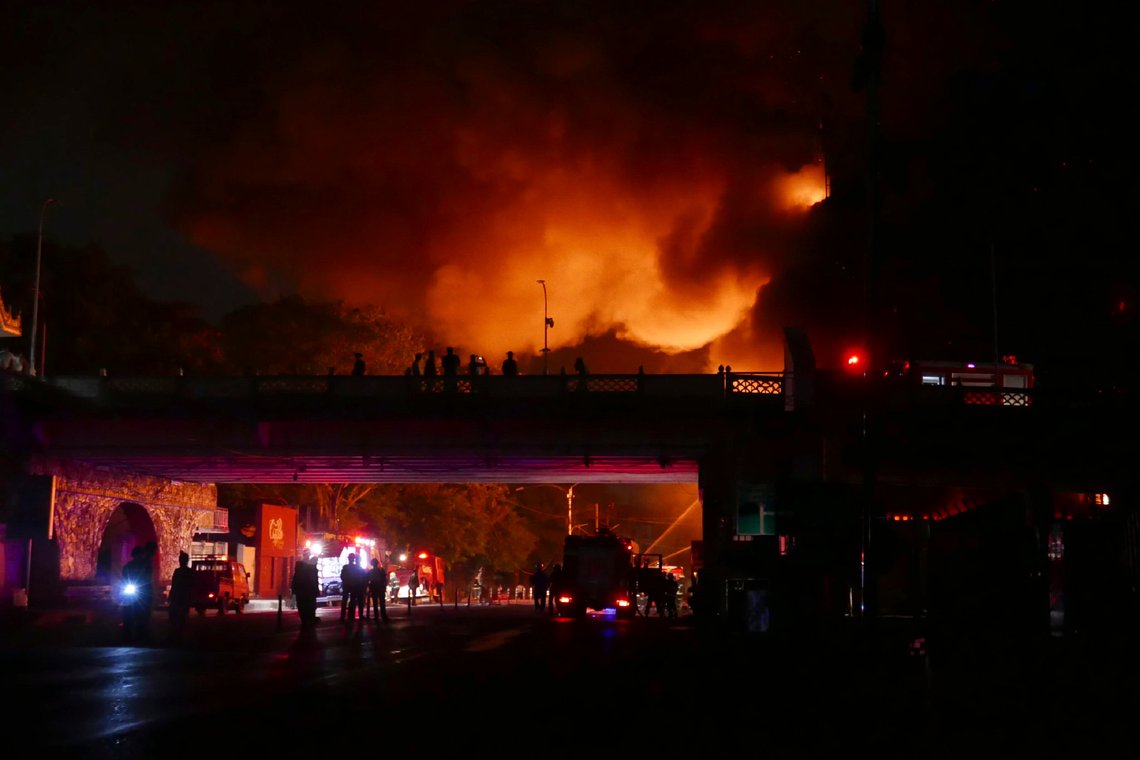 Flame rises after a fire broke out at the military-controlled Ruby Mart during a curfew in Yangon, Myanmar, early Thursday, April 1, 2021. (AP Photo) Flame rises after a fire broke out at the military-controlled Ruby Mart during a curfew in Yangon, Myanmar, early Thursday, April 1, 2021. (AP Photo)