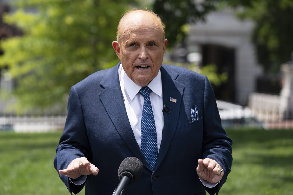 FILE - Rudy Giuliani, a personal attorney for President Donald Trump, talks with reporters outside the White House, Wednesday, July 1, 2020, in Washington. A voting technology company is suing Fox News, three of its top hosts, Giuliani and Sidney Powell for $2.7 billion, charging that the defendants conspired to spread false claims that the company helped steal the U.S. presidential election away from former President Donald Trump. (AP Photo/Evan Vucci, File) FILE - Rudy Giuliani, a personal attorney for President Donald Trump, talks with reporters outside the White House, Wednesday, July 1, 2020, in Washington. A voting technology company is suing Fox News, three of its top hosts, Giuliani and Sidney Powell for $2.7 billion, charging that the defendants conspired to spread false claims that the company helped steal the U.S. presidential election away from former President Donald Trump. (AP Photo/Evan Vucci, File)