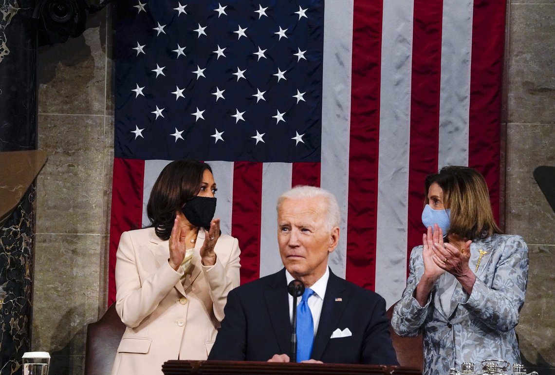 Vice President Kamala Harris and House Speaker Nancy Pelosi of Calif., look at each other as President Joe Biden addresses a joint session of Congress, Wednesday, April 28, 2021, in the House Chamber at the U.S. Capitol in Washington. (Melina Mara/The Washington Post via AP, Pool) Vice President Kamala Harris and House Speaker Nancy Pelosi of Calif., look at each other as President Joe Biden addresses a joint session of Congress, Wednesday, April 28, 2021, in the House Chamber at the U.S. Capitol in Washington. (Melina Mara/The Washington Post via AP, Pool)
