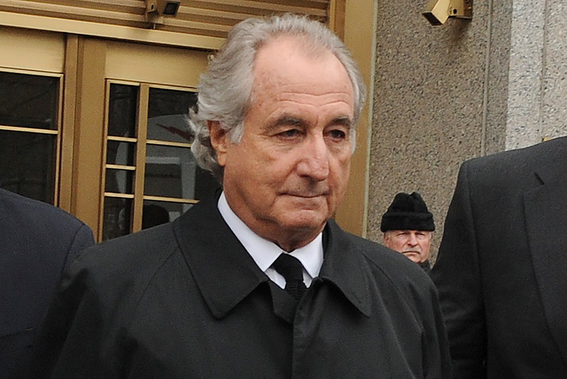 FILE - Bernard Madoff exits Manhattan federal court, Tuesday, March 10, 2009, in New York. Madoff, the financier who pleaded guilty to orchestrating the largest Ponzi scheme in history, died early Wednesday, April 14, 2021, in a federal prison, a person familiar with the matter told The Associated Press. (AP Photo/ Louis Lanzano, File) FILE - Bernard Madoff exits Manhattan federal court, Tuesday, March 10, 2009, in New York. Madoff, the financier who pleaded guilty to orchestrating the largest Ponzi scheme in history, died early Wednesday, April 14, 2021, in a federal prison, a person familiar with the matter told The Associated Press. (AP Photo/ Louis Lanzano, File)