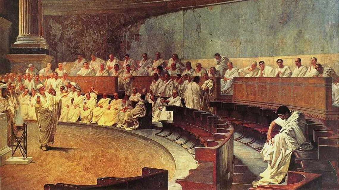 Cesare Maccari (1840–1919), «Cicero fordømmer Catilina» (1889), freske i Palazzo Madama i Roma, der Senatet i Italia holder til. Bildet viser en scene fra Senatet i den romerske republikken før Kristi fødsel, hvor det kunne gå svært hardt for seg. Maktkampen i dag står ikke nødvendigvis tilbake for den som skjedde mellom Cicero og Catilina, selv om virkemidlene ikke er helt sammenfallende. Cesare Maccari (1840–1919), «Cicero fordømmer Catilina» (1889), freske i Palazzo Madama i Roma, der Senatet i Italia holder til. Bildet viser en scene fra Senatet i den romerske republikken før Kristi fødsel, hvor det kunne gå svært hardt for seg. Maktkampen i dag står ikke nødvendigvis tilbake for den som skjedde mellom Cicero og Catilina, selv om virkemidlene ikke er helt sammenfallende.