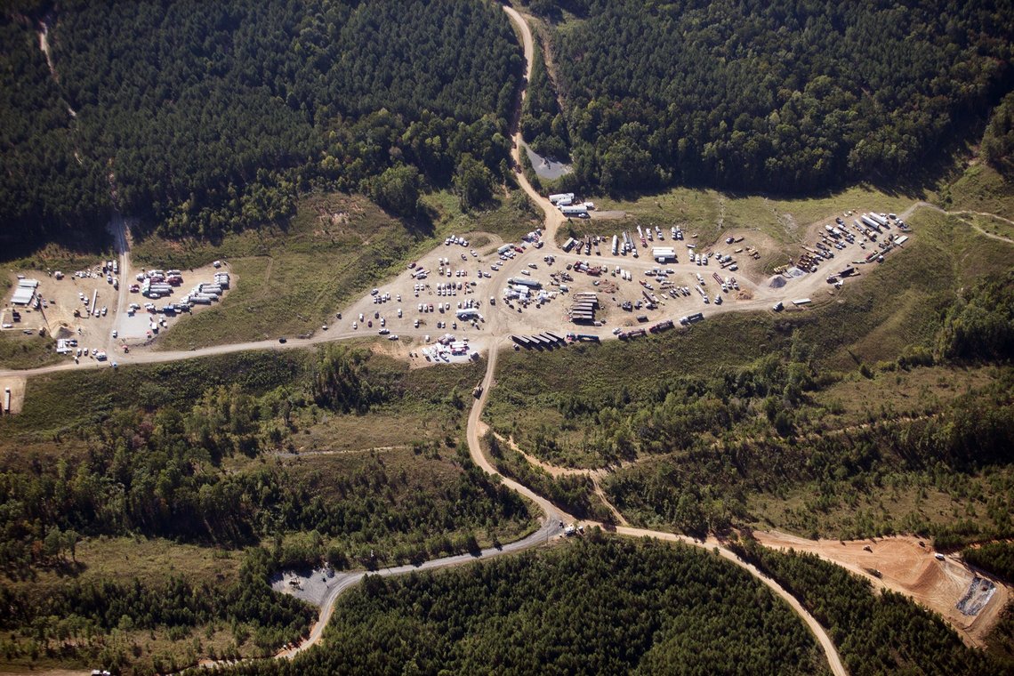 FILE - In this Sept. 20, 2016 file photo vehicles are seen near Colonial Pipeline in Helena, Ala. A major pipeline that transports fuels along the East Coast says it had to stop operations because it was the victim of a cyberattack. Colonial Pipeline said in a statement late Friday that it took certain systems offline to contain the threat, which has temporarily halted all pipeline operations, and affected some of our IT systems. (AP Photo/Brynn Anderson, File) FILE - In this Sept. 20, 2016 file photo vehicles are seen near Colonial Pipeline in Helena, Ala. A major pipeline that transports fuels along the East Coast says it had to stop operations because it was the victim of a cyberattack. Colonial Pipeline said in a statement late Friday that it took certain systems offline to contain the threat, which has temporarily halted all pipeline operations, and affected some of our IT systems. (AP Photo/Brynn Anderson, File)