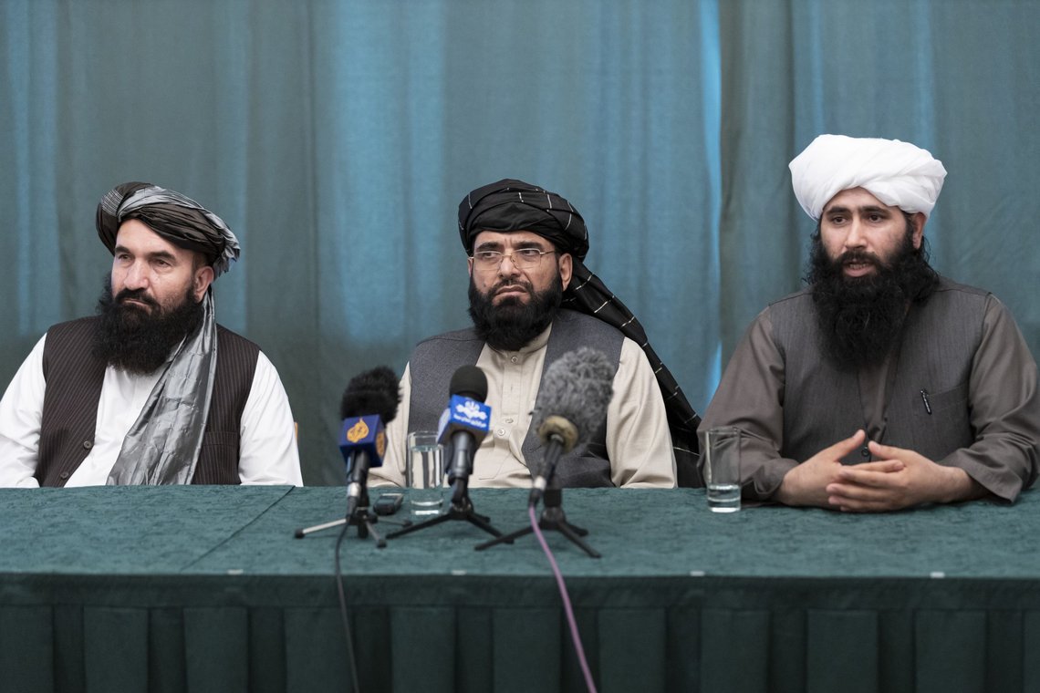 Members of the Taliban delegation from the left: Khairullah Khairkhwa, former western Herat Governor and one of five Taliban released from the U.S. prison on Guantanamo Bay in exchange for U.S. soldier Bowe Bergdahl, Suhail Shaheen, member of negotiation team, Mohammad Naeem, spokesman for the Taliban's political office attend their joint news conference in Moscow, Russia, Friday, March 19, 2021. The Taliban warned Washington against defying a May 1 deadline for the withdrawal of American and NATO troops from Afghanistan promising a "reaction". (AP Photo/Alexander Zemlianichenko, Pool) Members of the Taliban delegation from the left: Khairullah Khairkhwa, former western Herat Governor and one of five Taliban released from the U.S. prison on Guantanamo Bay in exchange for U.S. soldier Bowe Bergdahl, Suhail Shaheen, member of negotiation team, Mohammad Naeem, spokesman for the Taliban's political office attend their joint news conference in Moscow, Russia, Friday, March 19, 2021. The Taliban warned Washington against defying a May 1 deadline for the withdrawal of American and NATO troops from Afghanistan promising a "reaction". (AP Photo/Alexander Zemlianichenko, Pool)