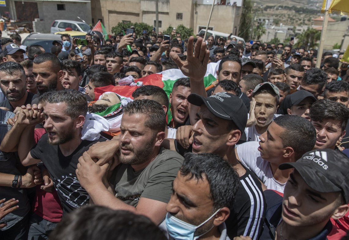 Begravelsen til 16-årige Saeed Oudeh i landsbyen Odia nær Nablus torsdag 6. mai.Saeed Oudeh ble drept i sammenstøt med israelske soldater. Det er likhetspunkter med BLM-protester i USA. Foto: Nasser Nasser/AP/NTB Begravelsen til 16-årige Saeed Oudeh i landsbyen Odia nær Nablus torsdag 6. mai.Saeed Oudeh ble drept i sammenstøt med israelske soldater. Det er likhetspunkter med BLM-protester i USA. Foto: Nasser Nasser/AP/NTB
