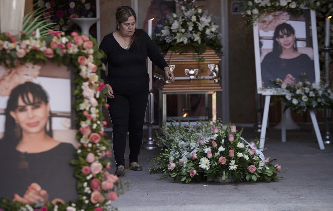 A woman attends the wake of mayoral candidate Alma Barragan in Moroleon, Mexico, Wednesday, May 26, 2021. Barragan was killed Tuesday while campaigning for the mayorship of the city of Moroleon, in violence-plagued Guanajuato state. (AP Photo/Armando Solis) A woman attends the wake of mayoral candidate Alma Barragan in Moroleon, Mexico, Wednesday, May 26, 2021. Barragan was killed Tuesday while campaigning for the mayorship of the city of Moroleon, in violence-plagued Guanajuato state. (AP Photo/Armando Solis)