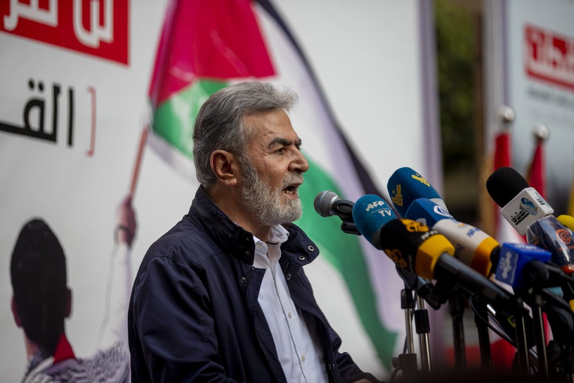 Ziad Nakhaleh, the leader of the Palestinian Islamic Jihad group speaks during a rally organized by Lebanon's militant Hezbollah group to express solidarity with the Palestinian people, in the southern suburb of Beirut, Lebanon, Monday, May 17, 2021. Nakhaleh has made a rare public appearance in Beirut where he vowed that his group will keep fighting Israel that he described as "weaker than a spider's web." (AP Photo/Hassan Ammar) Ziad Nakhaleh, the leader of the Palestinian Islamic Jihad group speaks during a rally organized by Lebanon's militant Hezbollah group to express solidarity with the Palestinian people, in the southern suburb of Beirut, Lebanon, Monday, May 17, 2021. Nakhaleh has made a rare public appearance in Beirut where he vowed that his group will keep fighting Israel that he described as "weaker than a spider's web." (AP Photo/Hassan Ammar)