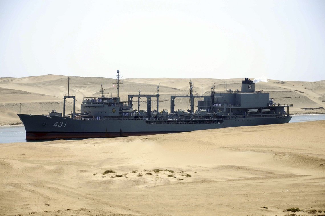 The Iranian navy's replenishment vessel IS Kharg passes through the Suez canal at Ismailia, Egypt, Tuesday, Feb.22, 2011. The Kharg accompanied by the frigate IS Alvand entered the Suez Canal on Tuesday en route to Syria, officials said, the first time in three decades that Tehran has sent military ships through the strategic waterway.(AP Photo) / SCANPIX Code: 436 The Iranian navy's replenishment vessel IS Kharg passes through the Suez canal at Ismailia, Egypt, Tuesday, Feb.22, 2011. The Kharg accompanied by the frigate IS Alvand entered the Suez Canal on Tuesday en route to Syria, officials said, the first time in three decades that Tehran has sent military ships through the strategic waterway.(AP Photo) / SCANPIX Code: 436