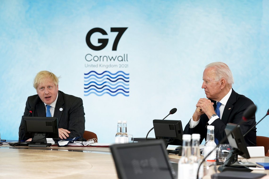 British Prime Minister Boris Johnson, left, speaks as President Joe Biden listens during the G-7 summit at the Carbis Bay Hotel in Carbis Bay, St. Ives, Cornwall, England, Friday, June 11, 2021. Leaders of the G-7 begin their first of three days of meetings on Friday, in which they will discuss COVID-19, climate, foreign policy and the economy. (Kevin Lamarque/Pool via AP) British Prime Minister Boris Johnson, left, speaks as President Joe Biden listens during the G-7 summit at the Carbis Bay Hotel in Carbis Bay, St. Ives, Cornwall, England, Friday, June 11, 2021. Leaders of the G-7 begin their first of three days of meetings on Friday, in which they will discuss COVID-19, climate, foreign policy and the economy. (Kevin Lamarque/Pool via AP)