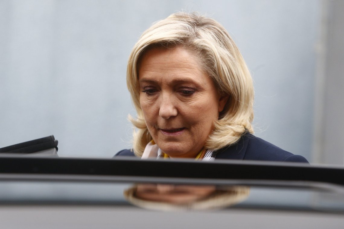 Far-right leader Marine Le Pen enters her car after voting for the regional elections in Henin-Beaumont, northern France, Sunday, June 27, 2021. A decisive, second round of voting in regional elections in France on Sunday is being scrutinized as a litmus test of whether the anti-immigration far right is gaining in acceptability and electability ahead of the French presidential election next year. (AP Photo/Michel Spingler) Far-right leader Marine Le Pen enters her car after voting for the regional elections in Henin-Beaumont, northern France, Sunday, June 27, 2021. A decisive, second round of voting in regional elections in France on Sunday is being scrutinized as a litmus test of whether the anti-immigration far right is gaining in acceptability and electability ahead of the French presidential election next year. (AP Photo/Michel Spingler)