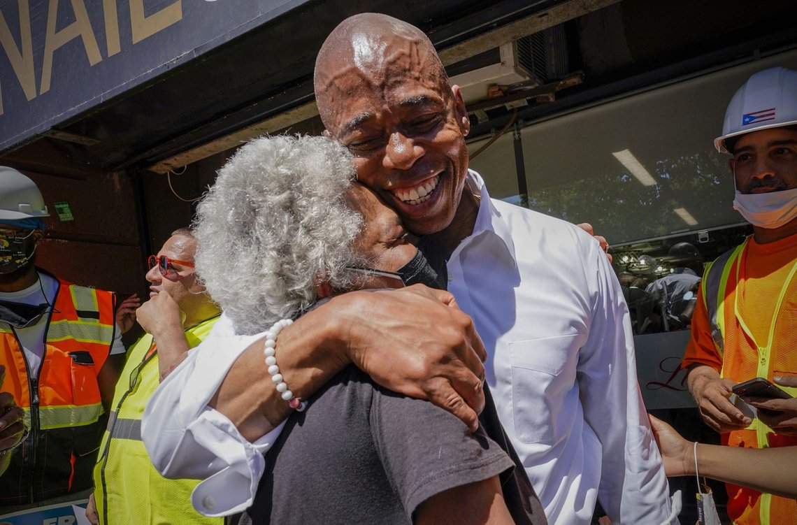 FILE - In this Thursday, June 17, 2021, file photo, Democratic mayoral candidate Eric Adams hugs a supporter after a campaign event in the Harlem neighborhood of New York. Adams has won the Democratic primary for mayor of New York City. Adams triumphed over a large field in New York's first major race to use ranked choice voting. (AP Photo/Mary Altaffer, File) FILE - In this Thursday, June 17, 2021, file photo, Democratic mayoral candidate Eric Adams hugs a supporter after a campaign event in the Harlem neighborhood of New York. Adams has won the Democratic primary for mayor of New York City. Adams triumphed over a large field in New York's first major race to use ranked choice voting. (AP Photo/Mary Altaffer, File)