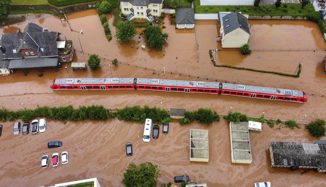 FILE - In this Thursday, July 15, 2021, 2021 file photo, a regional train in the flood waters at the local station in Kordel, Germany, after it was flooded by the high waters of the Kyll river. This summer a lot of the places hit by weather disasters are not used to getting extremes and many of them are wealthier, which is different from the normal climate change victims. That includes unprecedented deadly flooding in Germany and Belgium, 116-degree heat records in Portland, Oregon and similar blistering temperatures in Canada, along with wildfires. Now Southern Europe is seeing scorching temperatures and out-of-control blazes too. And the summer of extremes is only getting started. Peak Atlantic hurricane and wildfire seasons in the United States are knocking at the door. (Sebastian Schmitt/dpa via AP, File) FILE - In this Thursday, July 15, 2021, 2021 file photo, a regional train in the flood waters at the local station in Kordel, Germany, after it was flooded by the high waters of the Kyll river. This summer a lot of the places hit by weather disasters are not used to getting extremes and many of them are wealthier, which is different from the normal climate change victims. That includes unprecedented deadly flooding in Germany and Belgium, 116-degree heat records in Portland, Oregon and similar blistering temperatures in Canada, along with wildfires. Now Southern Europe is seeing scorching temperatures and out-of-control blazes too. And the summer of extremes is only getting started. Peak Atlantic hurricane and wildfire seasons in the United States are knocking at the door. (Sebastian Schmitt/dpa via AP, File)