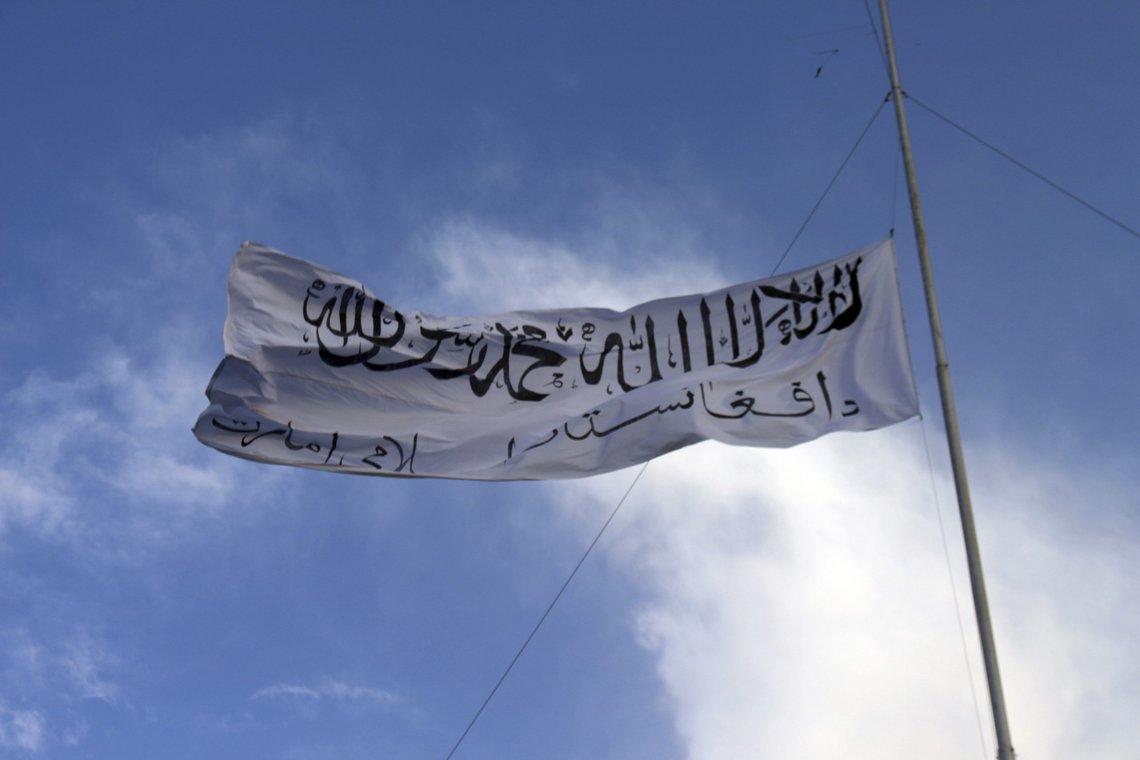 The Taliban flag flies at the Ghazni provincial governor's house, in Ghazni, southeastern, Afghanistan, Sunday, Aug. 15, 2021. (AP Photo/Gulabuddin Amiri) The Taliban flag flies at the Ghazni provincial governor's house, in Ghazni, southeastern, Afghanistan, Sunday, Aug. 15, 2021. (AP Photo/Gulabuddin Amiri)