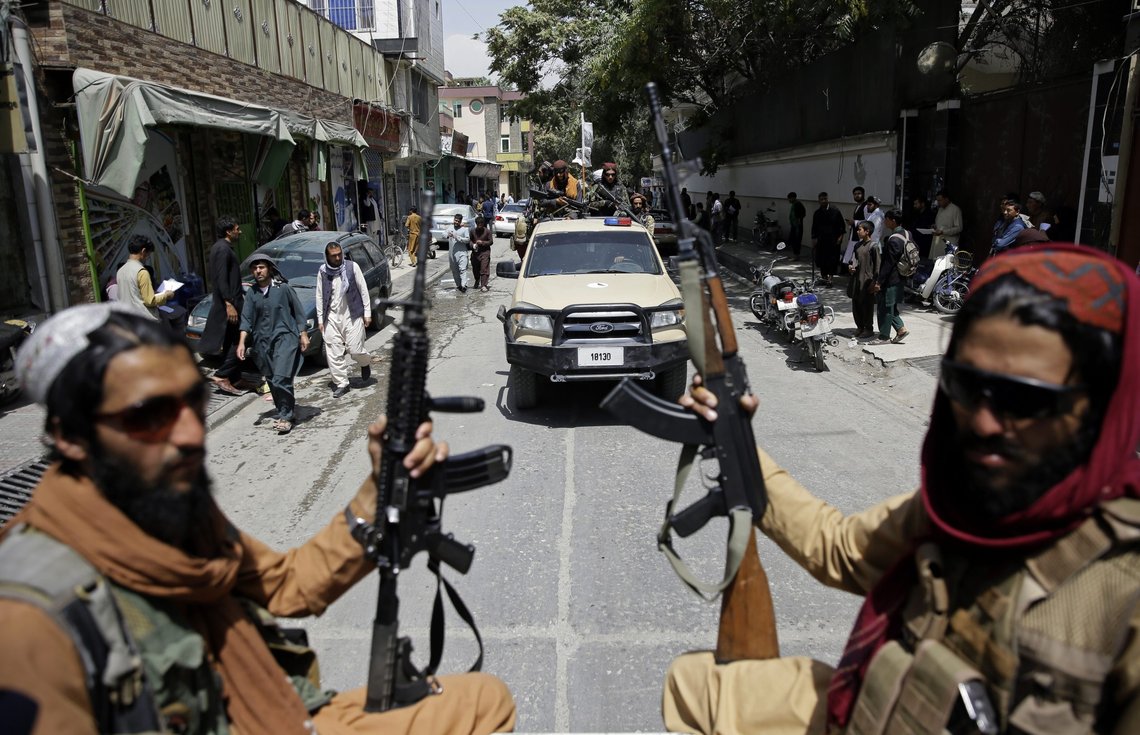 Taliban fighters patrol Kabul, Afghanistan, Thursday, Aug. 19, 2021. The Taliban celebrated Afghanistan's Independence Day on Thursday by declaring they beat the United States, but challenges to their rule ranging from running a country severely short on cash and bureaucrats to potentially facing an armed opposition began to emerge. (AP Photo/Rahmat Gul) Taliban fighters patrol Kabul, Afghanistan, Thursday, Aug. 19, 2021. The Taliban celebrated Afghanistan's Independence Day on Thursday by declaring they beat the United States, but challenges to their rule ranging from running a country severely short on cash and bureaucrats to potentially facing an armed opposition began to emerge. (AP Photo/Rahmat Gul)