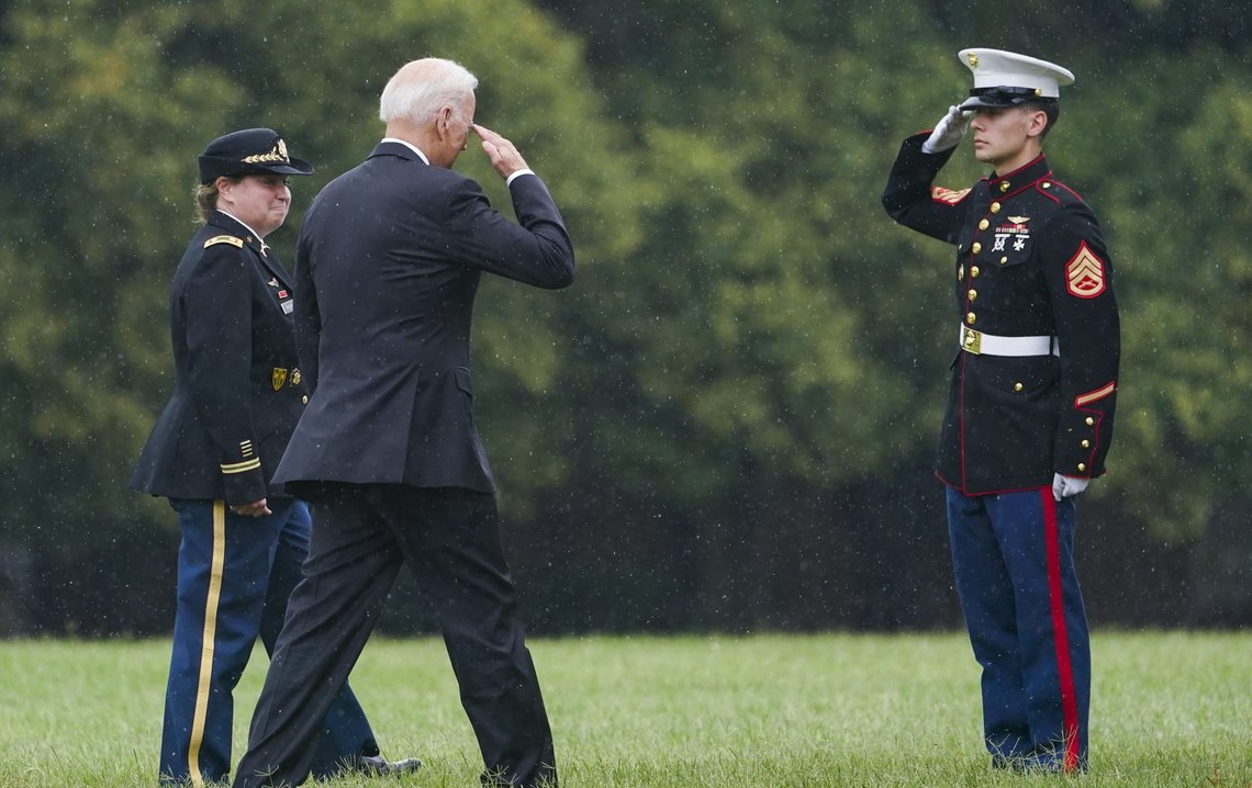 President Joe Biden returns a salute as he walks to board Marine One at Fort Lesley J. McNair in Washington, Monday, Aug. 16, 2021, en route to Camp David after addressing the nation from the White House about Afghanistan. (AP Photo/Manuel Balce Ceneta) President Joe Biden returns a salute as he walks to board Marine One at Fort Lesley J. McNair in Washington, Monday, Aug. 16, 2021, en route to Camp David after addressing the nation from the White House about Afghanistan. (AP Photo/Manuel Balce Ceneta)