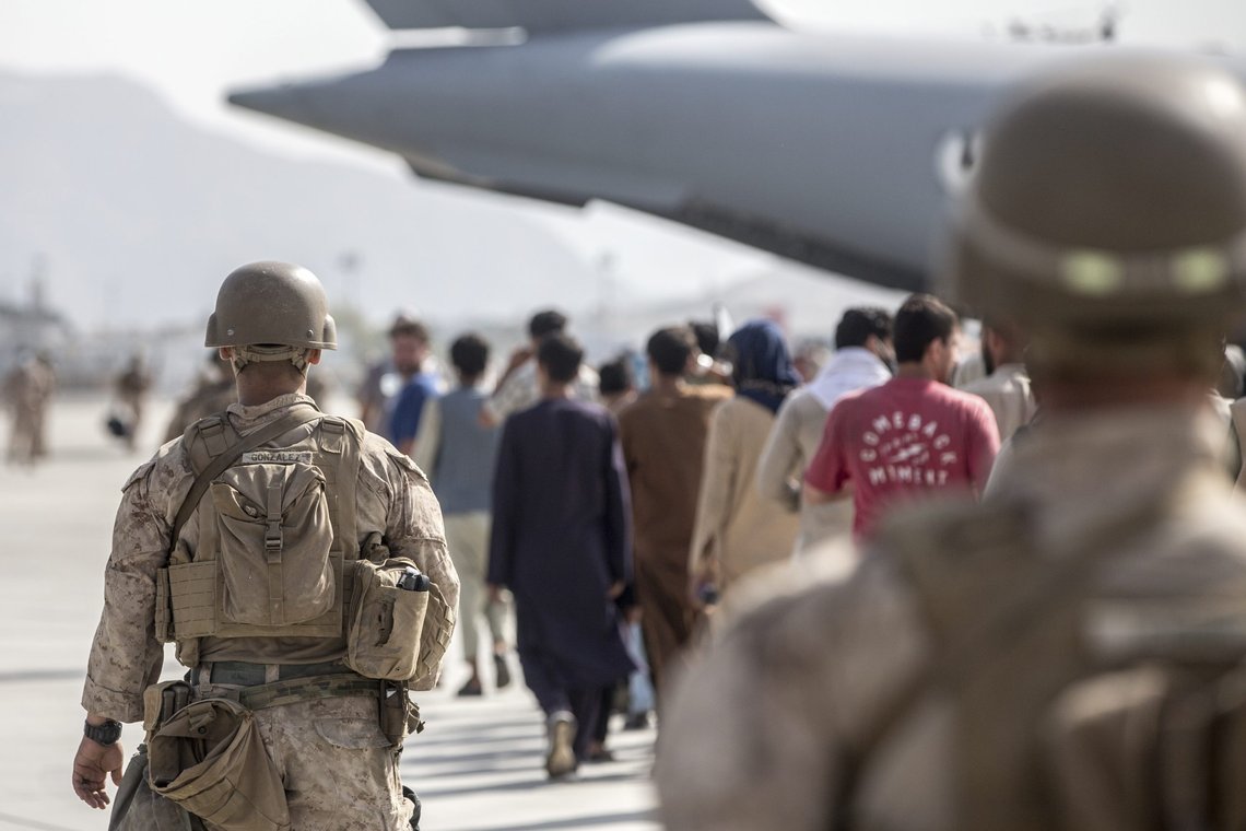 In this Aug. 21, 2021, photo provided by the U.S. Marine Corps, Marines with Special Purpose Marine Air-Ground Task Force-Crisis Response-Central Command (SPMAGTF-CR-CC) guide evacuees on to a U.S. Air Force Boeing C-17 Globemaster III during an evacuation at Hamid Karzai International Airport in Kabul, Afghanistan. (Sgt. Samuel Ruiz/U.S. Marine Corps via AP) In this Aug. 21, 2021, photo provided by the U.S. Marine Corps, Marines with Special Purpose Marine Air-Ground Task Force-Crisis Response-Central Command (SPMAGTF-CR-CC) guide evacuees on to a U.S. Air Force Boeing C-17 Globemaster III during an evacuation at Hamid Karzai International Airport in Kabul, Afghanistan. (Sgt. Samuel Ruiz/U.S. Marine Corps via AP)