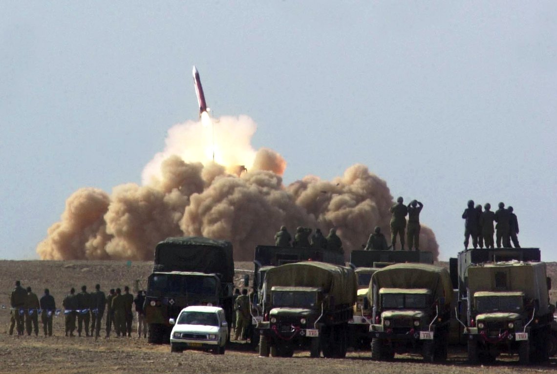Israeli soldiers watch as a Patriot missile is launching during a joint US-Israeli forces maneuver in the Negev desert, southern Israel Tuesday Feb. 4, 2003. Israeli and American forces fired a salvo of Patriot missiles as part of a joint exercise, codenamed "Juniper Cobra", to test air defenses ahead of a possible U.S.-Iraq war. The Israeli military confirmed six launches and said more missiles could be fired in the next few days. (AP Photo/HO/IDF) Israeli soldiers watch as a Patriot missile is launching during a joint US-Israeli forces maneuver in the Negev desert, southern Israel Tuesday Feb. 4, 2003. Israeli and American forces fired a salvo of Patriot missiles as part of a joint exercise, codenamed "Juniper Cobra", to test air defenses ahead of a possible U.S.-Iraq war. The Israeli military confirmed six launches and said more missiles could be fired in the next few days. (AP Photo/HO/IDF)