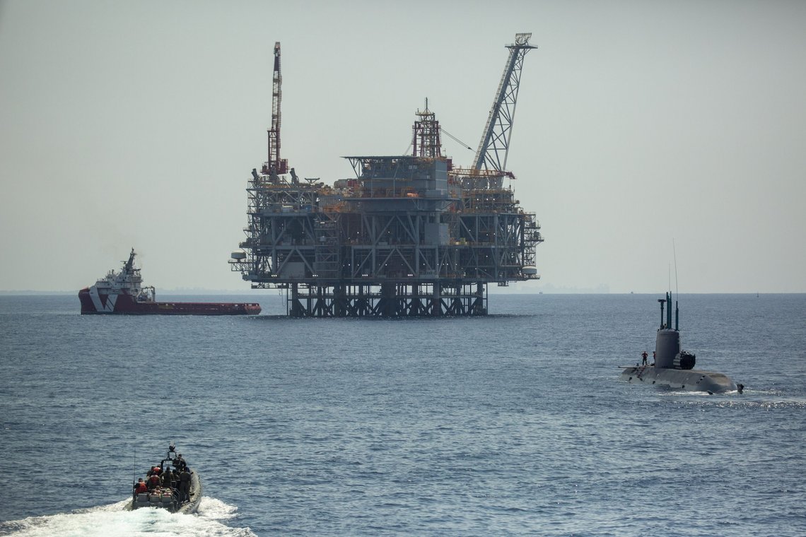 An oil platform in Israel's offshore Leviathan gas field is seen from on board the Israeli Navy Ship Atzmaut as a submarine patrols, in the Mediterranean Sea, Wednesday, Sept. 1, 2021. One of the navys most important responsibilities is protecting Israels natural gas platforms in the Mediterranean Sea, which now provide some 75% of the countrys electricity. (AP Photo/Ariel Schalit) An oil platform in Israel's offshore Leviathan gas field is seen from on board the Israeli Navy Ship Atzmaut as a submarine patrols, in the Mediterranean Sea, Wednesday, Sept. 1, 2021. One of the navys most important responsibilities is protecting Israels natural gas platforms in the Mediterranean Sea, which now provide some 75% of the countrys electricity. (AP Photo/Ariel Schalit)