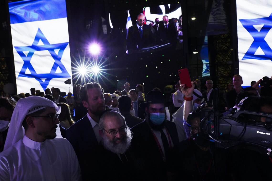 Jewish and Arab attendees celebrate the opening of the Israeli pavilion at Expo 2020 in Dubai, United Arab Emirates, Thursday, Oct. 7, 2021. Israel ceremonially opened its gleaming pavilion at the world's fair in Dubai on Thursday, over a year after normalizing ties with the United Arab Emirates and amid a pandemic that has disrupted much of the tourist and cultural exchanges promised by the U.S.-brokered accords. (AP Photo/Jon Gambrell) Jewish and Arab attendees celebrate the opening of the Israeli pavilion at Expo 2020 in Dubai, United Arab Emirates, Thursday, Oct. 7, 2021. Israel ceremonially opened its gleaming pavilion at the world's fair in Dubai on Thursday, over a year after normalizing ties with the United Arab Emirates and amid a pandemic that has disrupted much of the tourist and cultural exchanges promised by the U.S.-brokered accords. (AP Photo/Jon Gambrell)