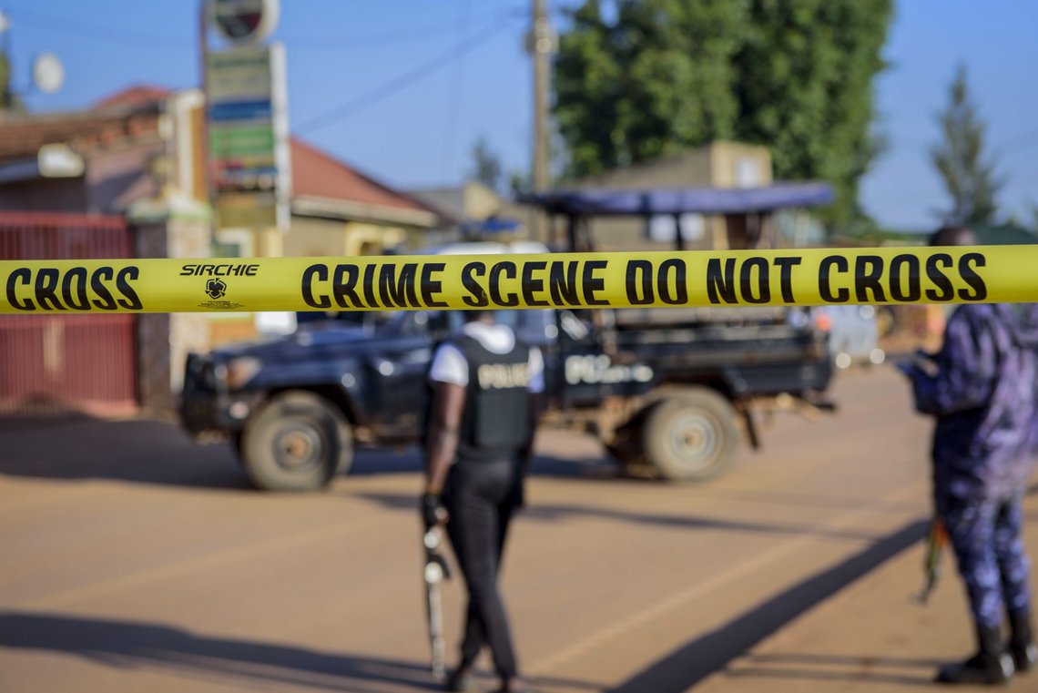 Police secure a road leading to the scene of an explosion in the Komamboga suburb of the capital Kampala, Uganda Sunday, Oct. 24, 2021. Police said one person was killed and several others injured in the explosion late Saturday and that detectives would "determine whether the explosion arose from an intentional act or not." (AP Photo/Nicholas Bamulanzeki) Police secure a road leading to the scene of an explosion in the Komamboga suburb of the capital Kampala, Uganda Sunday, Oct. 24, 2021. Police said one person was killed and several others injured in the explosion late Saturday and that detectives would "determine whether the explosion arose from an intentional act or not." (AP Photo/Nicholas Bamulanzeki)