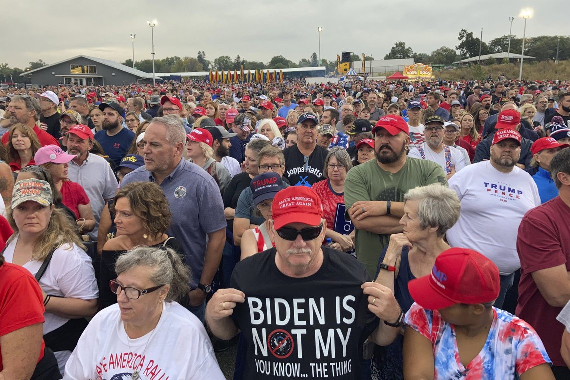 People gather ahead of an appearance by former President Donald Trump at a rally at the Iowa State Fairgrounds in Des Moines, Iowa., Saturday, Oct. 9, 2021. (AP Photo/Thomas Beaumont) People gather ahead of an appearance by former President Donald Trump at a rally at the Iowa State Fairgrounds in Des Moines, Iowa., Saturday, Oct. 9, 2021. (AP Photo/Thomas Beaumont)