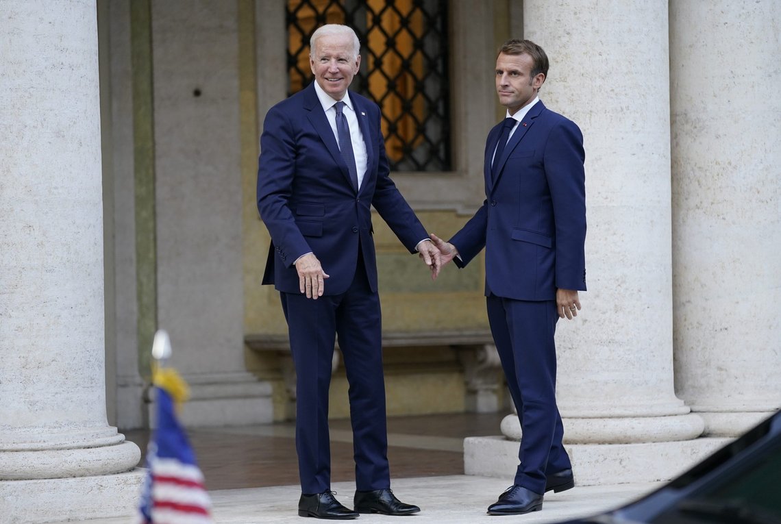 U.S. President Joe Biden, left, and French President Emmanuel Macron speak prior to a meeting at La Villa Bonaparte in Rome, Friday, Oct. 29, 2021. A Group of 20 summit scheduled for this weekend in Rome is the first in-person gathering of leaders of the world's biggest economies since the COVID-19 pandemic started. (AP Photo/Evan Vucci) U.S. President Joe Biden, left, and French President Emmanuel Macron speak prior to a meeting at La Villa Bonaparte in Rome, Friday, Oct. 29, 2021. A Group of 20 summit scheduled for this weekend in Rome is the first in-person gathering of leaders of the world's biggest economies since the COVID-19 pandemic started. (AP Photo/Evan Vucci)
