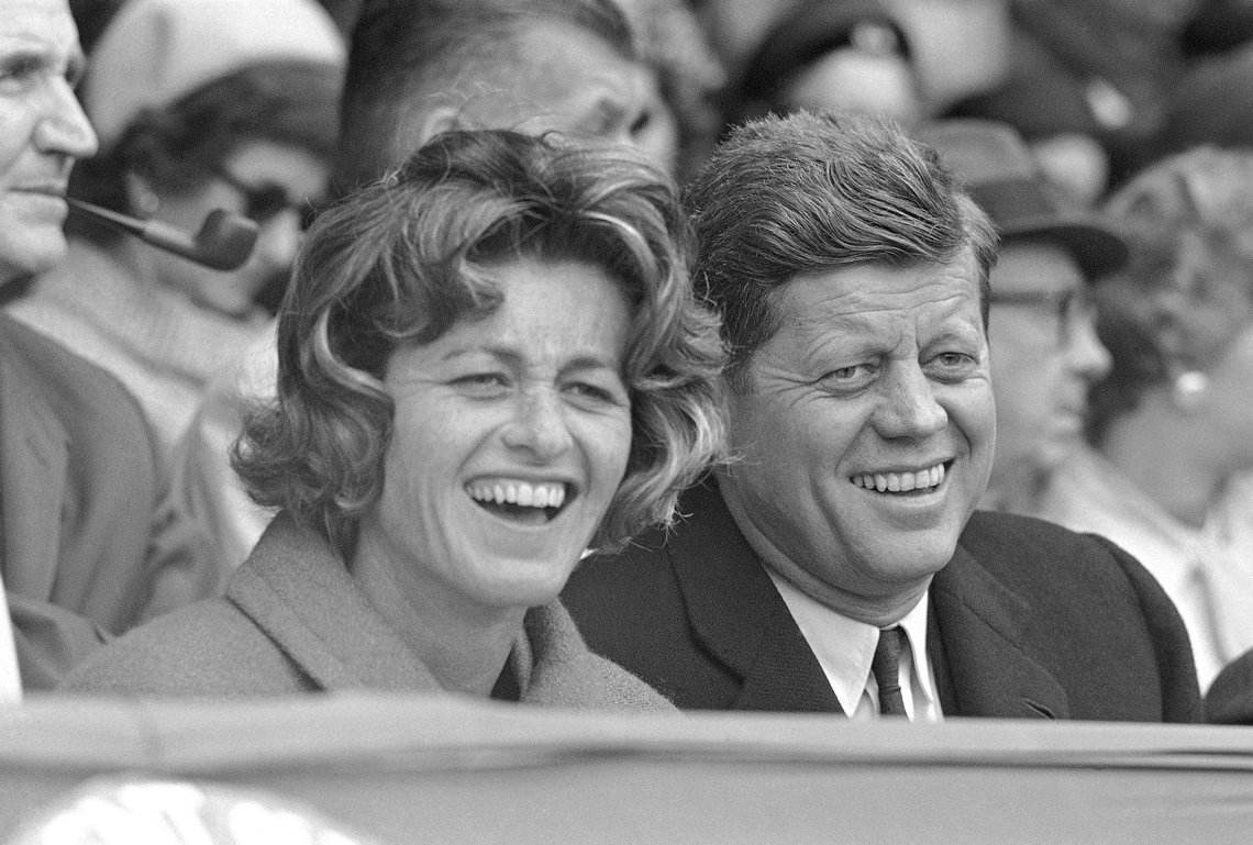 FILE - In this April 10, 1961, file photo, President John F. Kennedy and his sister, Jean Kennedy Smith, watch an opening day baseball game at Griffith Stadium in Washington. Smith, the youngest sister and last surviving sibling of President John F. Kennedy, died at 92, her daughter Kym confirmed to the New York Times. (AP Photo/File) FILE - In this April 10, 1961, file photo, President John F. Kennedy and his sister, Jean Kennedy Smith, watch an opening day baseball game at Griffith Stadium in Washington. Smith, the youngest sister and last surviving sibling of President John F. Kennedy, died at 92, her daughter Kym confirmed to the New York Times. (AP Photo/File)