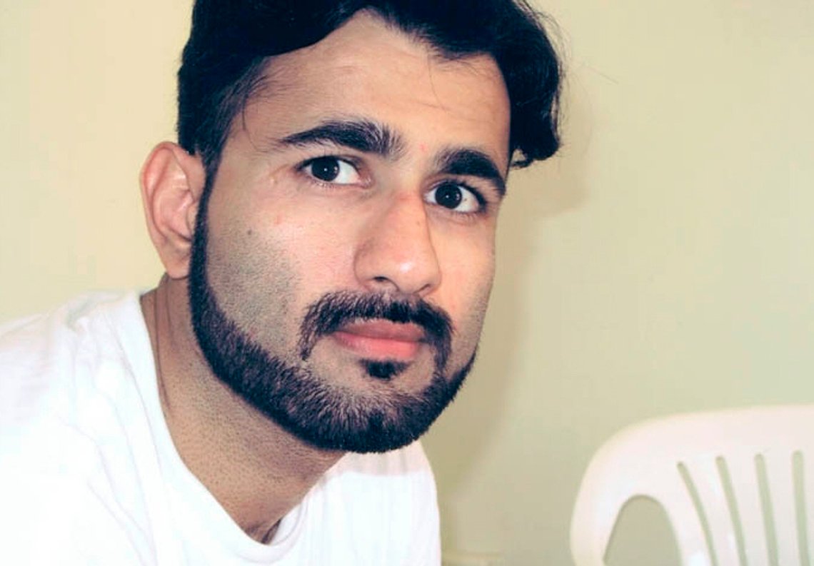 This 2018 photo provided by the Center for Constitutional Rights shows Majid Khan. A military jury imposed a sentence of 26 years Friday, Oct. 29, 2021, on Khan, a former Maryland man who admitted joining al-Qaida and has been held at the Guantanamo Bay detention center. But under a plea deal, the man could be released as soon as next year because of his cooperation with U.S. authorities. (Center for Constitutional Rights via AP) This 2018 photo provided by the Center for Constitutional Rights shows Majid Khan. A military jury imposed a sentence of 26 years Friday, Oct. 29, 2021, on Khan, a former Maryland man who admitted joining al-Qaida and has been held at the Guantanamo Bay detention center. But under a plea deal, the man could be released as soon as next year because of his cooperation with U.S. authorities. (Center for Constitutional Rights via AP)