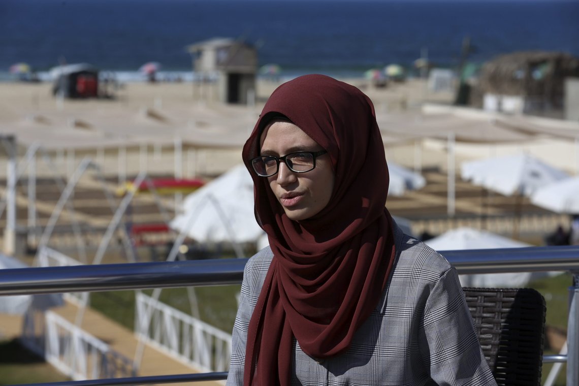 Afaf al-Najar kom seg ikke ut av Gaza som følge av Hamas nye diskriminerede lov som tillater mannlige slektninger å hindre at kvinner reiser ut. (AP Photo/Adel Hana) Afaf al-Najar kom seg ikke ut av Gaza som følge av Hamas nye diskriminerede lov som tillater mannlige slektninger å hindre at kvinner reiser ut. (AP Photo/Adel Hana)