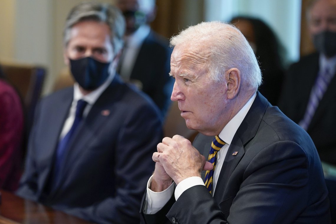 President Joe Biden speaks during a cabinet meeting in the Cabinet Room of the White House, Friday, Nov. 12, 2021, in Washington, as Secretary of State Antony Blinken listens. (AP Photo/Evan Vucci) President Joe Biden speaks during a cabinet meeting in the Cabinet Room of the White House, Friday, Nov. 12, 2021, in Washington, as Secretary of State Antony Blinken listens. (AP Photo/Evan Vucci)