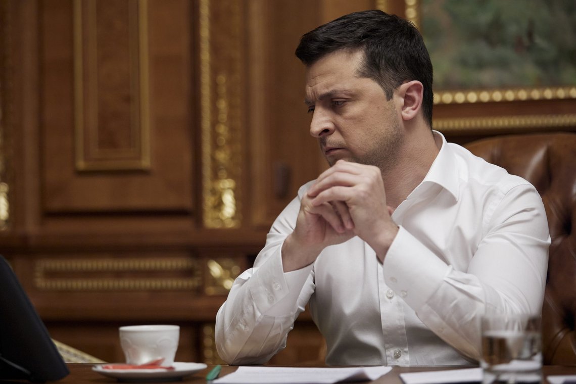 FILE - In this handout photo provided by the Ukrainian Presidential Press Office, Ukrainian President Volodymyr Zelenskyy speaks with U.S. President Joe Biden over the telephone in his office in Kyiv, Ukraine, Friday, Jan. 28, 2022. Zelenskyy sought to play down U.S. warnings of an imminent Russian invasion, saying that Western alarm has prompted many investors in the country's financial markets to cash out. (Ukrainian Presidential Press Office via AP, File) FILE - In this handout photo provided by the Ukrainian Presidential Press Office, Ukrainian President Volodymyr Zelenskyy speaks with U.S. President Joe Biden over the telephone in his office in Kyiv, Ukraine, Friday, Jan. 28, 2022. Zelenskyy sought to play down U.S. warnings of an imminent Russian invasion, saying that Western alarm has prompted many investors in the country's financial markets to cash out. (Ukrainian Presidential Press Office via AP, File)