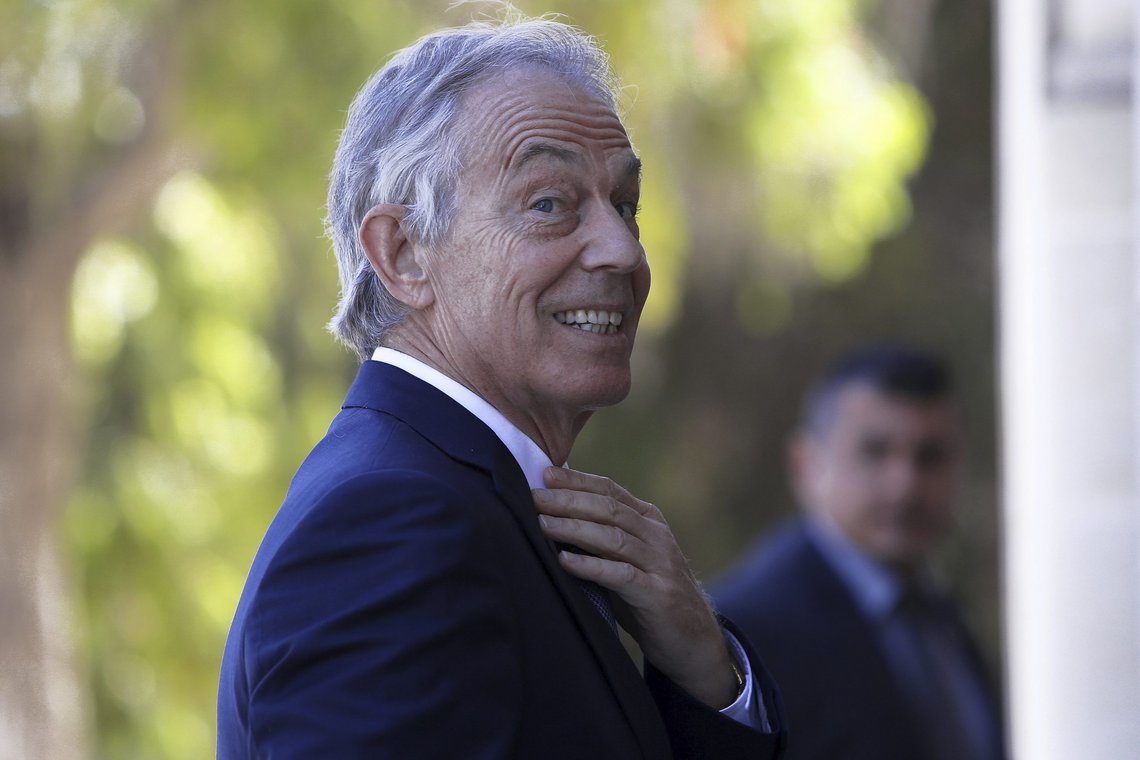 FILE - Former British Prime Minister Tony Blair arrives at the presidential palace for a meeting with Cyprus' President Nicos Anastasiades in capital Nicosia, Cyprus, Wednesday, April 4, 2018. Britain's Queen Elizabeth II made Blair a Knight Companion of the Most Noble Order of the Garter, the oldest and most senior British order of chivalry, in Britain's New Year's Honors list. (AP Photo/Petros Karadjias, File) FILE - Former British Prime Minister Tony Blair arrives at the presidential palace for a meeting with Cyprus' President Nicos Anastasiades in capital Nicosia, Cyprus, Wednesday, April 4, 2018. Britain's Queen Elizabeth II made Blair a Knight Companion of the Most Noble Order of the Garter, the oldest and most senior British order of chivalry, in Britain's New Year's Honors list. (AP Photo/Petros Karadjias, File)