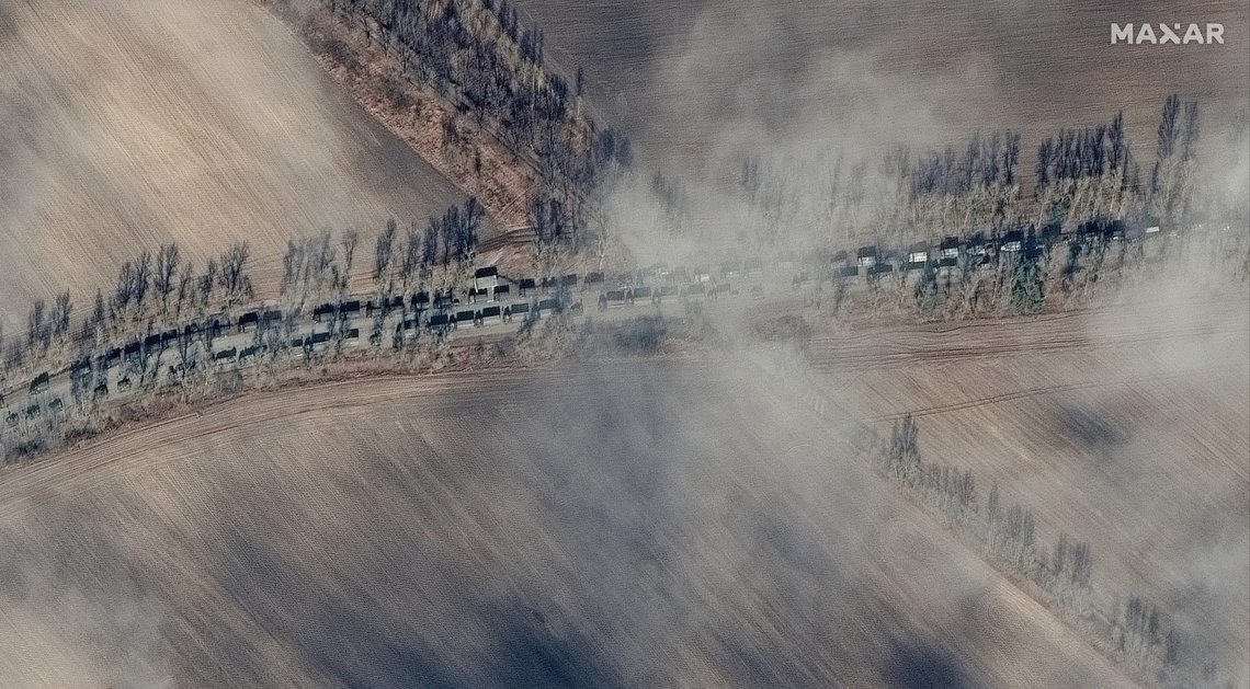 This satellite image image provided by Maxar Technologies shows the near southern end of a large deployment of Russian ground forces in a convoy northeast of Ivankiv, Ukraine, Sunday, Feb. 27, 2022. It extends for more than 3.25 miles--contains fuel, logistics and armored vehicles and is traveling along the P-02-02 road (Shevchenka Road) and moving towards Ivankiv. The convoy is moving in the direction of Kyiv—approximately 40 miles away. (Satellite image ©2022 Maxar Technologies via AP) This satellite image image provided by Maxar Technologies shows the near southern end of a large deployment of Russian ground forces in a convoy northeast of Ivankiv, Ukraine, Sunday, Feb. 27, 2022. It extends for more than 3.25 miles--contains fuel, logistics and armored vehicles and is traveling along the P-02-02 road (Shevchenka Road) and moving towards Ivankiv. The convoy is moving in the direction of Kyiv—approximately 40 miles away. (Satellite image ©2022 Maxar Technologies via AP)