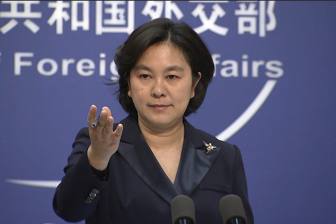 FILE - In this Jan. 20, 2021, file photo, Chinese Foreign Ministry spokesperson Hua Chunying speaks during the daily press briefing at the Foreign Ministry in Beijing. China is trying to spread doubt about the effectiveness of Western vaccines and the origin of the coronavirus as a World Health Organization-selected team of scientists are in the city where the pandemic first broke out. (AP Photo/Liu Zheng, File) FILE - In this Jan. 20, 2021, file photo, Chinese Foreign Ministry spokesperson Hua Chunying speaks during the daily press briefing at the Foreign Ministry in Beijing. China is trying to spread doubt about the effectiveness of Western vaccines and the origin of the coronavirus as a World Health Organization-selected team of scientists are in the city where the pandemic first broke out. (AP Photo/Liu Zheng, File)