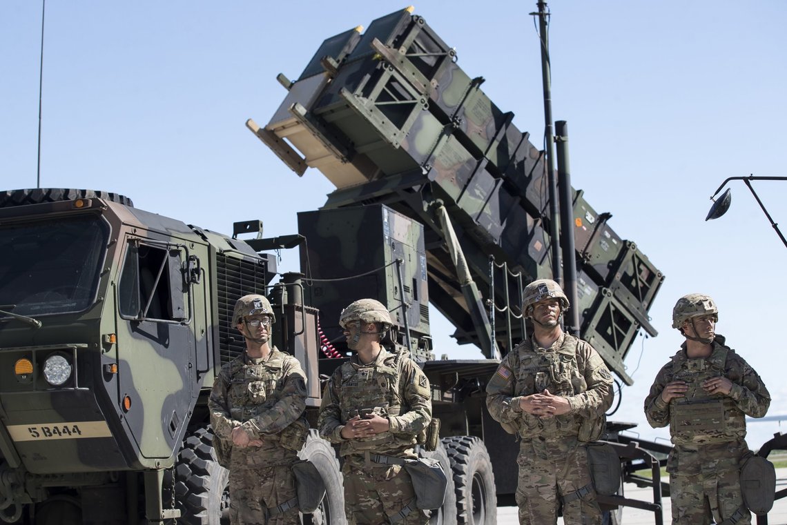 Members of US 10th Army Air and Missile Defense Command stands next to a Patriot surface-to-air missile battery during the NATO multinational ground based air defence units exercise "Tobruq Legacy 2017" at the Siauliai airbase some 230 km. (144 miles) east of the capital Vilnius, Lithuania, Thursday, July 20, 2017. The July deployment of US Patriot long-range missile system in Lithuania, demonstrates commitment to the security of Lithuania and adds to the strategic capabilities of the region. ((AP Photo/Mindaugas Kulbis) Members of US 10th Army Air and Missile Defense Command stands next to a Patriot surface-to-air missile battery during the NATO multinational ground based air defence units exercise "Tobruq Legacy 2017" at the Siauliai airbase some 230 km. (144 miles) east of the capital Vilnius, Lithuania, Thursday, July 20, 2017. The July deployment of US Patriot long-range missile system in Lithuania, demonstrates commitment to the security of Lithuania and adds to the strategic capabilities of the region. ((AP Photo/Mindaugas Kulbis)