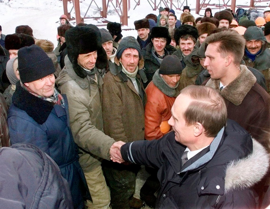 FILE - In this file photo taken on Friday, March 3, 2000, Acting President Vladimir Putin shakes hands with workers during his visit to an oil and gas field in Surgut, western Siberia, Russia. Vladimir Putin looks more invincible than ever before in his 18 years in power, after Russians invaded Ukraine, blanket-bombed Syria and hacked the U.S. election campaign. (AP Photo/Pool, File) FILE - In this file photo taken on Friday, March 3, 2000, Acting President Vladimir Putin shakes hands with workers during his visit to an oil and gas field in Surgut, western Siberia, Russia. Vladimir Putin looks more invincible than ever before in his 18 years in power, after Russians invaded Ukraine, blanket-bombed Syria and hacked the U.S. election campaign. (AP Photo/Pool, File)