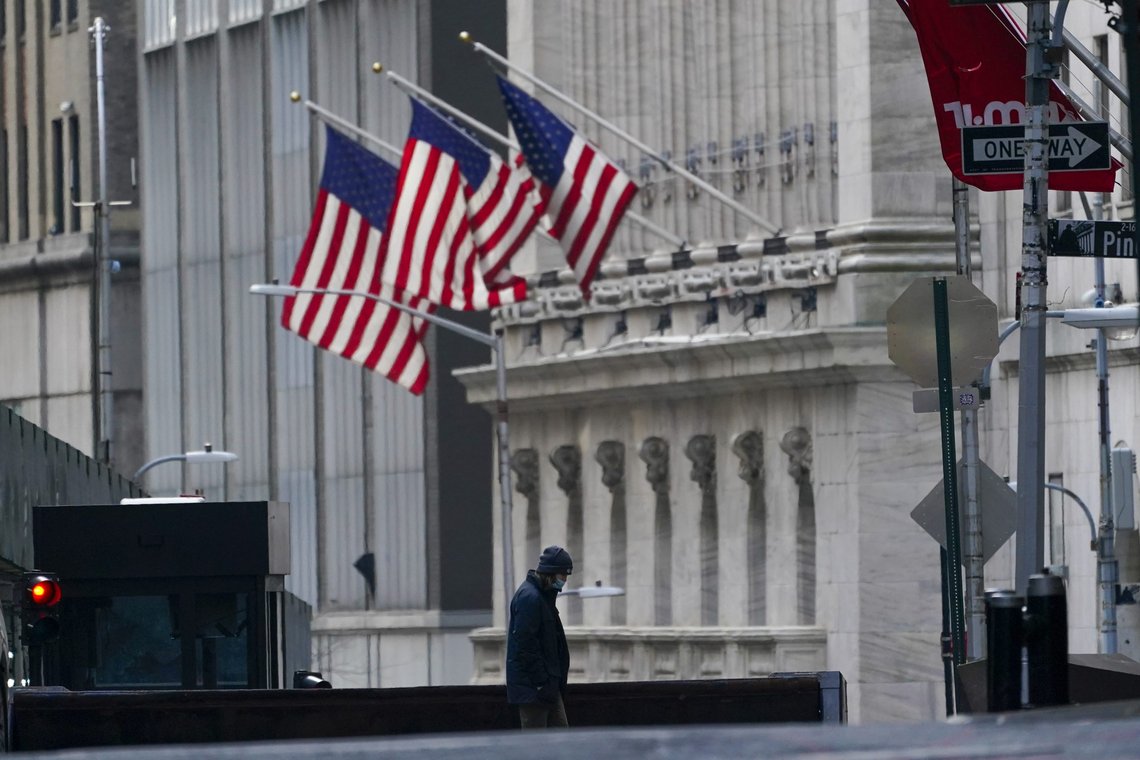 FILE - A security guard is seen next to a road block near the New York Stock exchange, Friday, Jan. 14, 2022, in the Financial District. Stocks are off to a muddled start on Wall Street, Tuesday, Feb. 8, as investors continue to struggle to predict how well the economy will weather the current bout of inflation as well as the Federal Reserve's medicine for healing it, higher interest rates. (AP Photo/Mary Altaffer, File) FILE - A security guard is seen next to a road block near the New York Stock exchange, Friday, Jan. 14, 2022, in the Financial District. Stocks are off to a muddled start on Wall Street, Tuesday, Feb. 8, as investors continue to struggle to predict how well the economy will weather the current bout of inflation as well as the Federal Reserve's medicine for healing it, higher interest rates. (AP Photo/Mary Altaffer, File)
